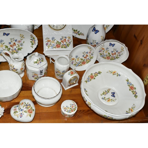 381 - A COLLECTION OF AYNSLEY GIFTWARES, in mainly Cottage Garden pattern, to include a wall clock, two fr... 