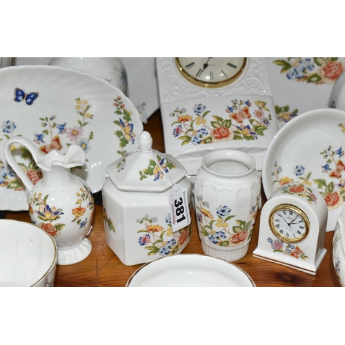 381 - A COLLECTION OF AYNSLEY GIFTWARES, in mainly Cottage Garden pattern, to include a wall clock, two fr... 