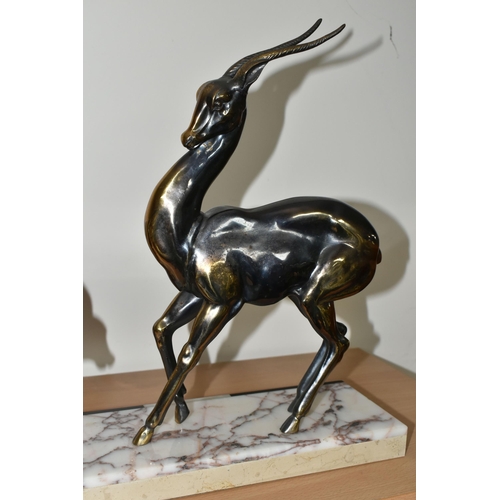 384 - AN ART DECO SCULPTURE OF A PAIR OF GAZELLES, in bronzed finish, on a three coloured marble plinth, h... 