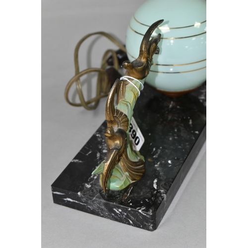 390 - AN ART DECO DESK LAMP DEPICTING A PAIR OF BRONZED BIRDS IN FLIGHT MOUNTED TO A MARBLE PLINTH, with g... 