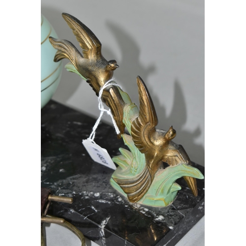 390 - AN ART DECO DESK LAMP DEPICTING A PAIR OF BRONZED BIRDS IN FLIGHT MOUNTED TO A MARBLE PLINTH, with g... 