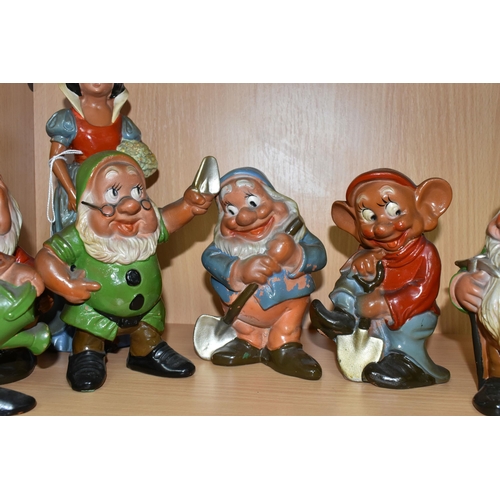 392 - A VINTAGE TERRACOTTA PART SET OF SNOW WHITE AND SIX OF THE DWARFS, hollow slip cast painted figures ... 