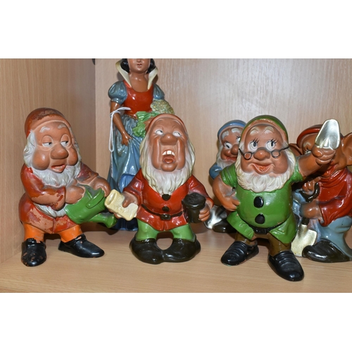 392 - A VINTAGE TERRACOTTA PART SET OF SNOW WHITE AND SIX OF THE DWARFS, hollow slip cast painted figures ... 