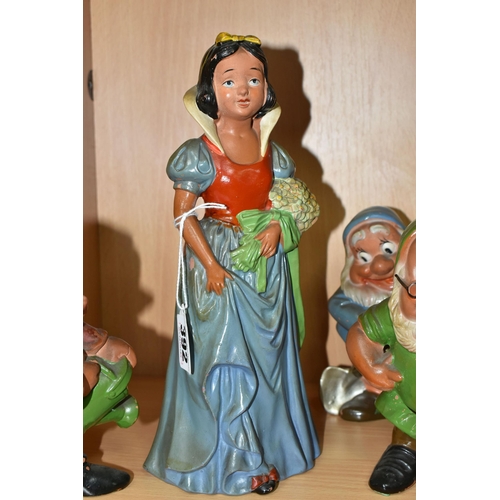 392 - A VINTAGE TERRACOTTA PART SET OF SNOW WHITE AND SIX OF THE DWARFS, hollow slip cast painted figures ... 