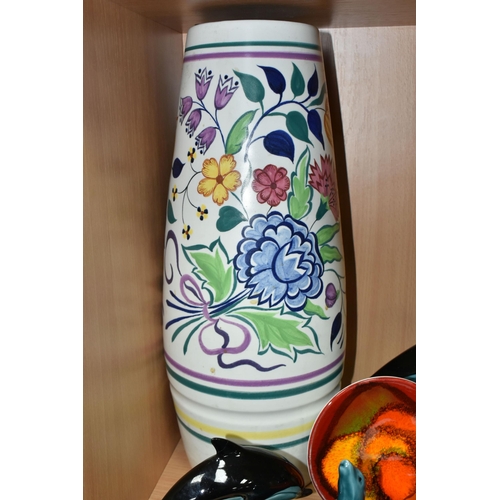 396 - A COLLECTION OF POOLE POTTERY, comprising a tall vase painted with flowers, height 40cm, a Delphis d... 