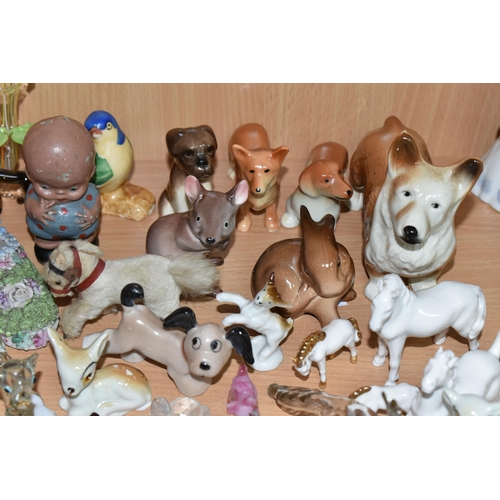 408 - A GROUP OF CERAMICS, GLASS AND OTHER ORNAMENTS, to include six Robertson's jam jazz band figures (tw... 