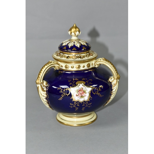 421 - AN EARLY 20TH CENTURY COALPORT POT POURRI, blue, pale yellow and gilt ground, with domed pierced cov... 