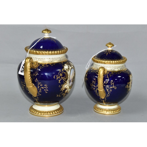 425 - TWO EARLY 20TH CENTURY COALPORT TWIN HANDLED VASES AND COVERS, blue, pale yellow and gilt ground, th... 