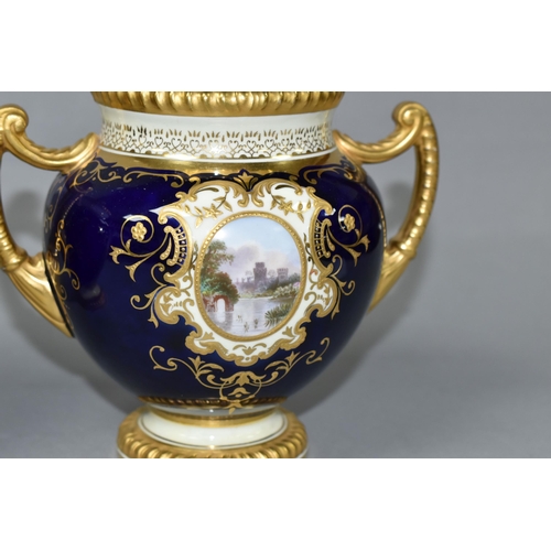 425 - TWO EARLY 20TH CENTURY COALPORT TWIN HANDLED VASES AND COVERS, blue, pale yellow and gilt ground, th... 