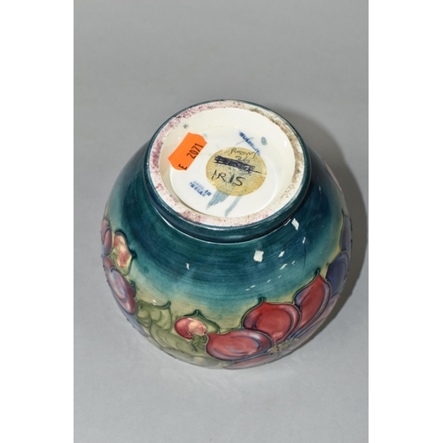 439 - A MOORCROFT POTTERY PLANTER, of rounded form, tube lined with a pink and purple Clematis pattern on ... 