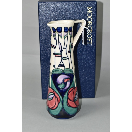 450 - A BOXED MOORCROFT EWER, signed in gold by Rachel Bishop with impressed and blue painted Moorcroft ma... 