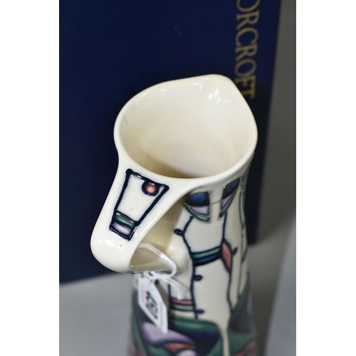 450 - A BOXED MOORCROFT EWER, signed in gold by Rachel Bishop with impressed and blue painted Moorcroft ma... 