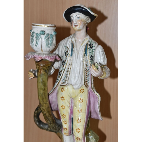 452 - A PAIR OF PORCELAIN FIGURAL CANDELABRA, blue painted marks to the base, together with a cherub candl... 