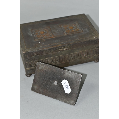 420 - A WMF SILVERPLATE ON COPPER BOX AND A CAST METAL PAPERWEIGHT, the WMF box having a hinged cover deco... 