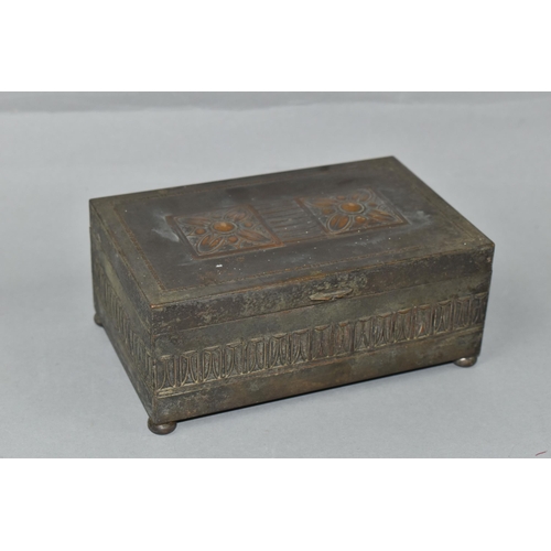 420 - A WMF SILVERPLATE ON COPPER BOX AND A CAST METAL PAPERWEIGHT, the WMF box having a hinged cover deco... 