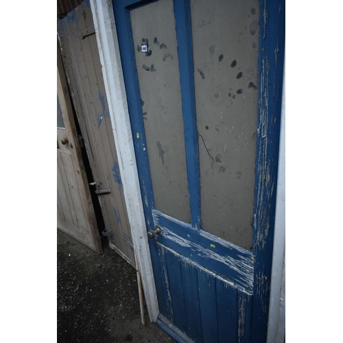 1002 - TWO BLUE PAINTED EXTERNAL WOODEN DOORS, both different ages and sizes, largest width 100cm x height ... 