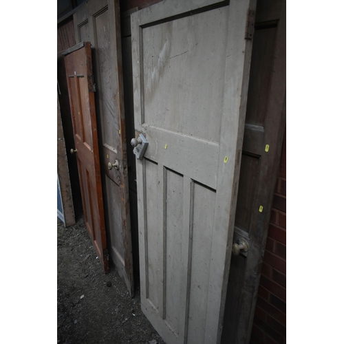 1003 - FIVE VARIOUS WOODEN DOORS, of various shapes, sizes and ages, largest width 92cm x height 214cm (con... 