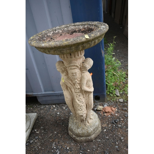 1007 - A COMPOSITE BIRDBATH, with a circular top, on a bulbous plinth with a square base, diameter 51cm x h... 