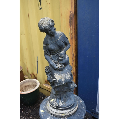 1010 - A BLACK PAINTED COMPOSITE GARDEN WATER FEATURE, of a woman sitting with a water ewer, on a separate ... 