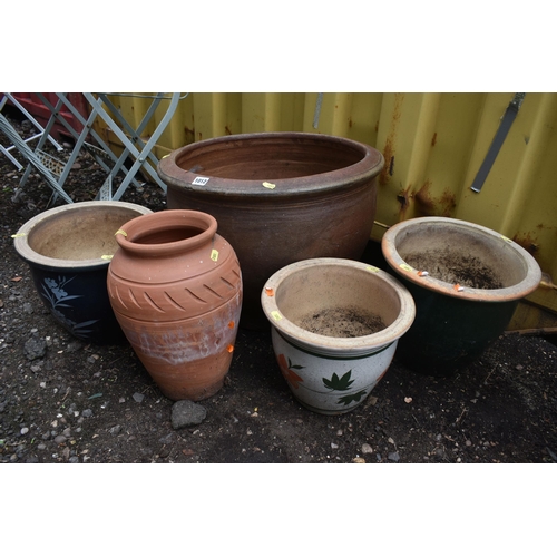 1012 - FIVE VARIOUS GARDEN POTS, to include a larger pot, diameter 52cm x height 38cm, three various glazed... 