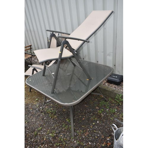 1019 - A FIVE PIECE PATIO SET, comprising a square glass top table, 106cm squared x 69cm height, and a set ... 