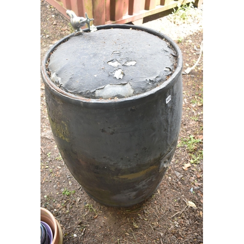 1023 - A BLACK PAINTED GALVANISED OIL BARREL, with a later added tap, diameter 66cm x height 92cm (conditio... 