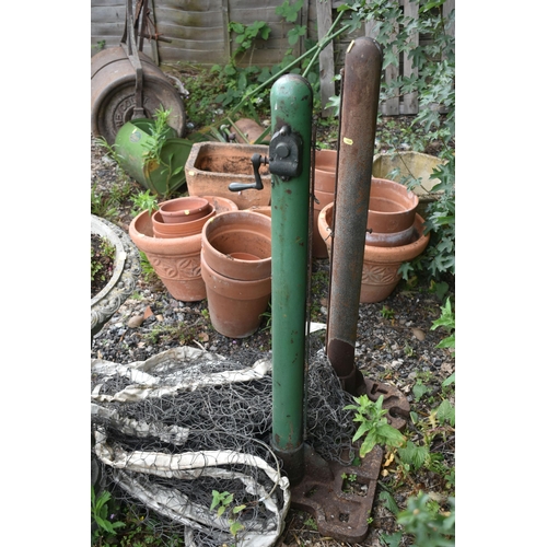 1031 - A PAIR OF B HIRST AND SONS ALL STEEL TENNIS POSTS, and net, the winding mechanism labelled 'THE LADY... 