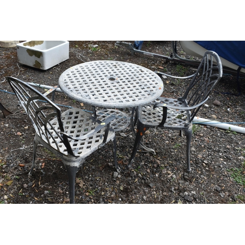 1034 - A GREY PAINTED THREE PIECE BISTRO SET, comprising a circular table, diameter 74cm x height 66cm, and... 