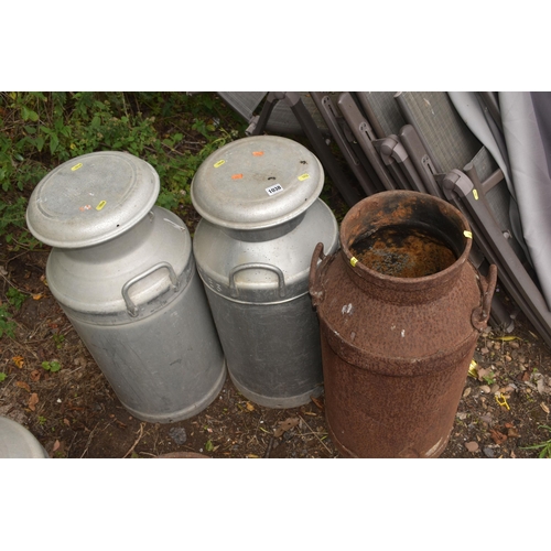 1038 - THREE GALVANISED MILK CHURNS, height 74cm (condition - one well rusted and missing lid) (3)