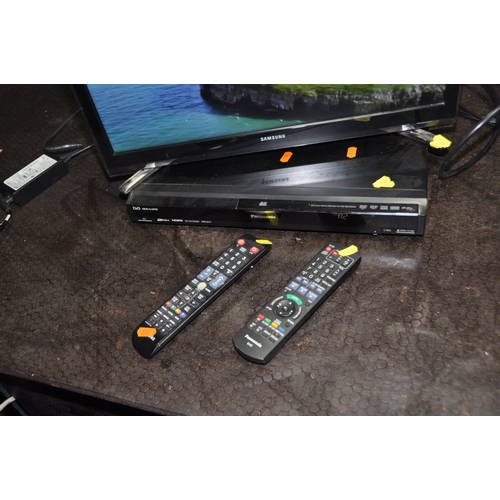 1061 - A SAMSUNG UE22F5400 22in SMART TV with power supply and remote and a Panasonic DMR-EX77 DVD HDD reco... 