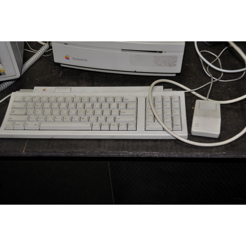 1079 - AN APPLE MACINTOSH 2si M0360 VINTAGE PERSONAL COMPUTER with Apple Keyboard 2, an Apple Desktop Bus M... 