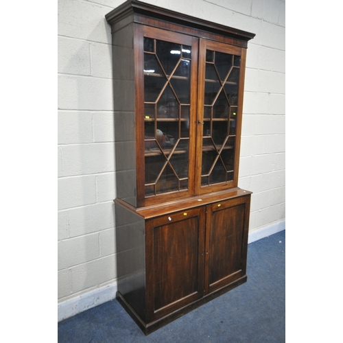 1212 - A GEORGIAN MAHOGANY ASTRAGAL GLAZED TWO DOOR BOOKCASE, over a two-door cupboard, top glazed bookcase... 