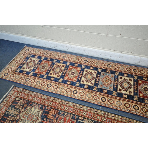 1224 - A TURKISH PATTERNED WOOL ON COTTON CARPET RUNNER, 300cm x 76cm, along with a similar smaller carpet ... 