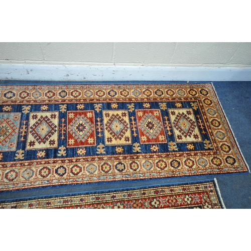 1224 - A TURKISH PATTERNED WOOL ON COTTON CARPET RUNNER, 300cm x 76cm, along with a similar smaller carpet ... 