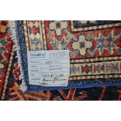 1224 - A TURKISH PATTERNED WOOL ON COTTON CARPET RUNNER, 300cm x 76cm, along with a similar smaller carpet ... 