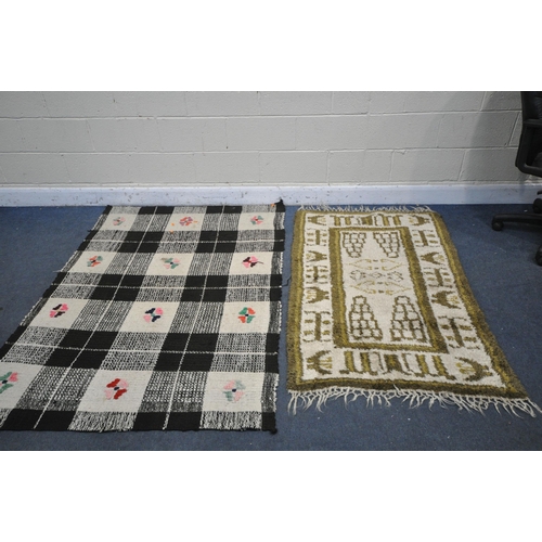 1225 - A WOOLLEN TEKKE RUG, with a blue field, 145cm x 99 cm, and a similar carpet runner 183cm x 63cm, alo... 