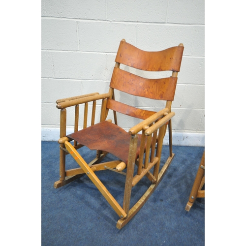 1229 - A PAIR OF MID CENTURY COSTA RICAN BEECH FRAMED AND LEATHER STRAPPED FOLDING ROCKING CHAIRS (conditio... 