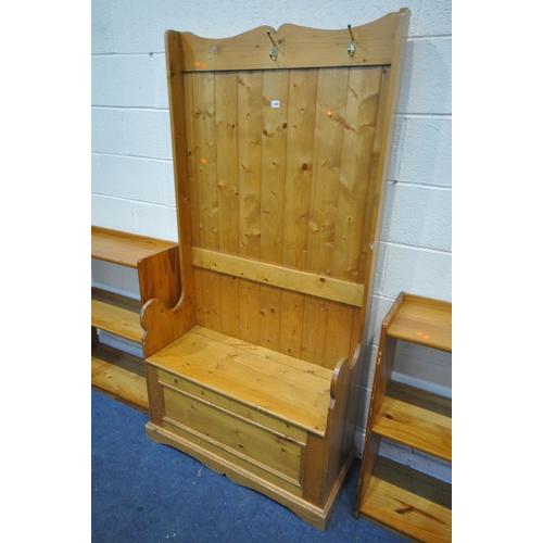 1230 - A MODERN PINE HALL BENCH, with a raised back and hidden storage, width 95cm x depth 40cm x height 18... 