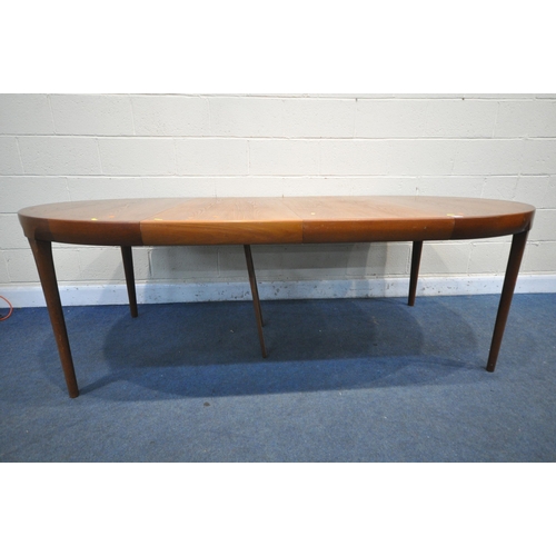 1239 - A FAARUP MOBELFABRIK DEIGN FOR BY IB KOFOD LARSEN, A MID CENTURY TEAK EXTENDING DINING TABLE, with t... 