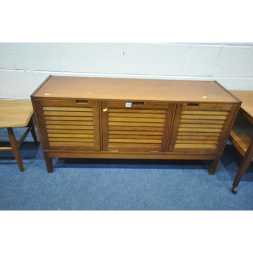 1243 - A MID CENTURY TEAK SMALL SIDEBOARD, with two cupboard doors flanking a fall front door, width 122cm ... 