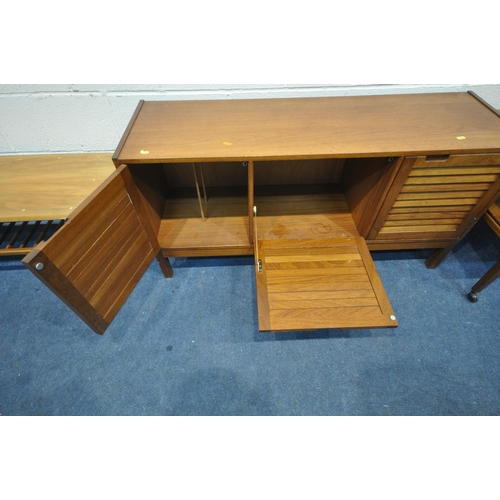 1243 - A MID CENTURY TEAK SMALL SIDEBOARD, with two cupboard doors flanking a fall front door, width 122cm ... 