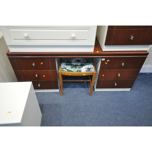 1244 - A MODERN THREE PIECE BEDROOM SUITE, comprising a dressing table, and a pair of two drawer bedside ca... 