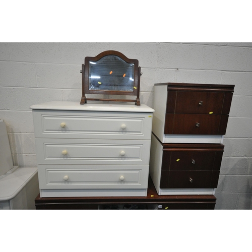 1244 - A MODERN THREE PIECE BEDROOM SUITE, comprising a dressing table, and a pair of two drawer bedside ca... 