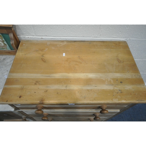 1247 - A PINE WASHSTAND, with three drawers, beside a single cupboard door, with a tiled back marble top, w... 