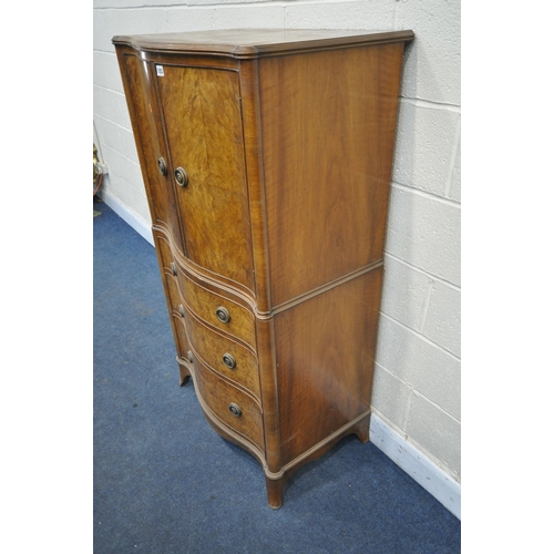 1253 - A REPRODUCTION BURR WALNUT SERPENTINE TALLBOY, with two cupboard doors enclosing a single shelf, abo... 