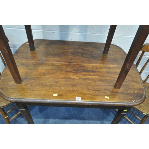 1256 - AN OAK RECTANGULAR TABLE, with rounded edges, on square tapered legs, and spade feet, length 106cm x... 