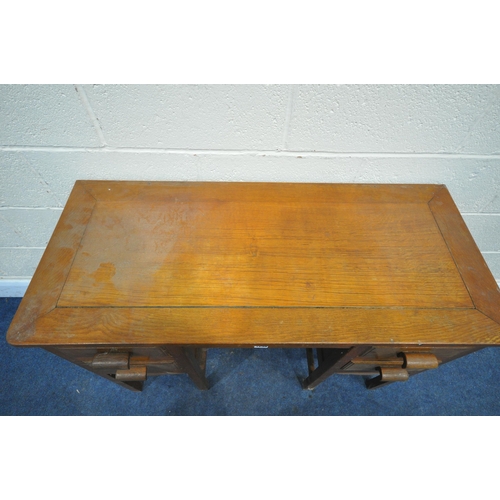 1258 - A 20TH CENTURY OAK KNEEHOLE DESK, with four drawers, length 105cm x 46cm x height 76cm, along with a... 