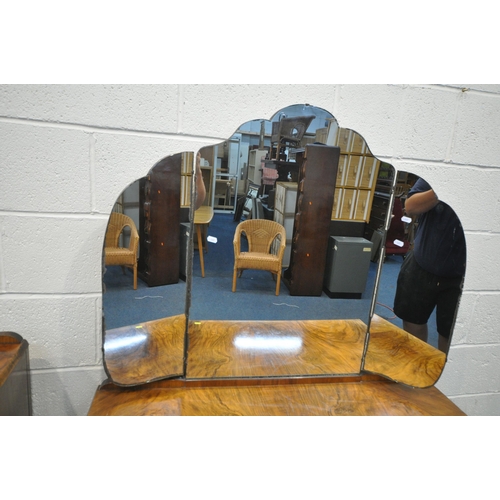 1263 - AN EARLY TO MID 20TH CENTURY WALNUT DRESSING TABLE, with a triple swing mirror, four various drawers... 