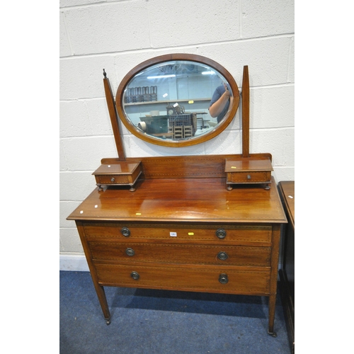 1267 - A MAHOGANY AND INLAID DRESSING CHEST, with an oval swing mirror, five various drawers, and square ta... 