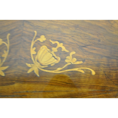 1273 - A VICTORIAN WALNUT AND MARQUETRY INLAID OVAL TILT TOP LOO TABLE, with four foliate carved legs, leng... 